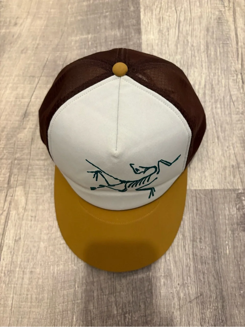 Arc’teryx Bird Trucker Hat Brown Mustard Yellow White Panel Skeleton Embroidery